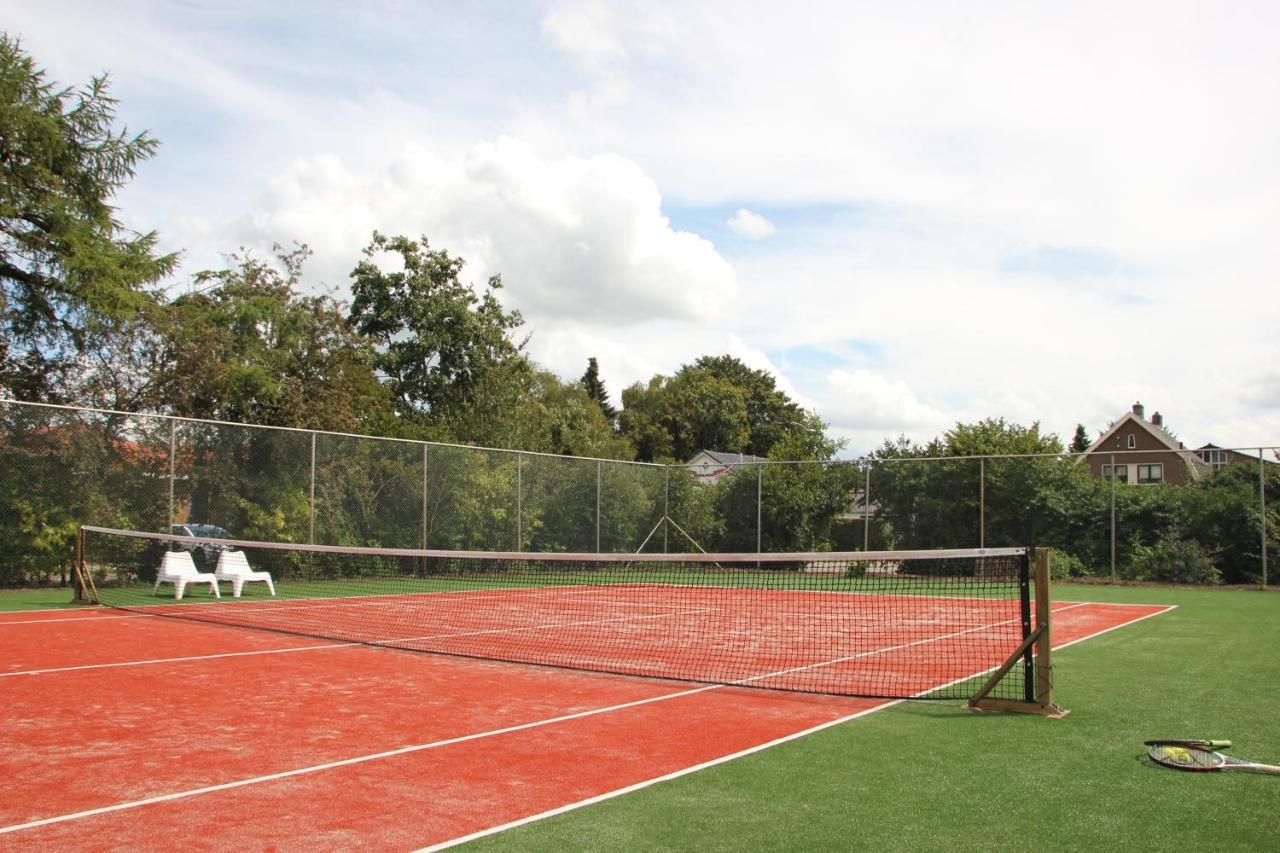 Familiehuis De Betuwe Met Prive Kunstgras Tennisbaan En Sauna Villa Erichem Esterno foto